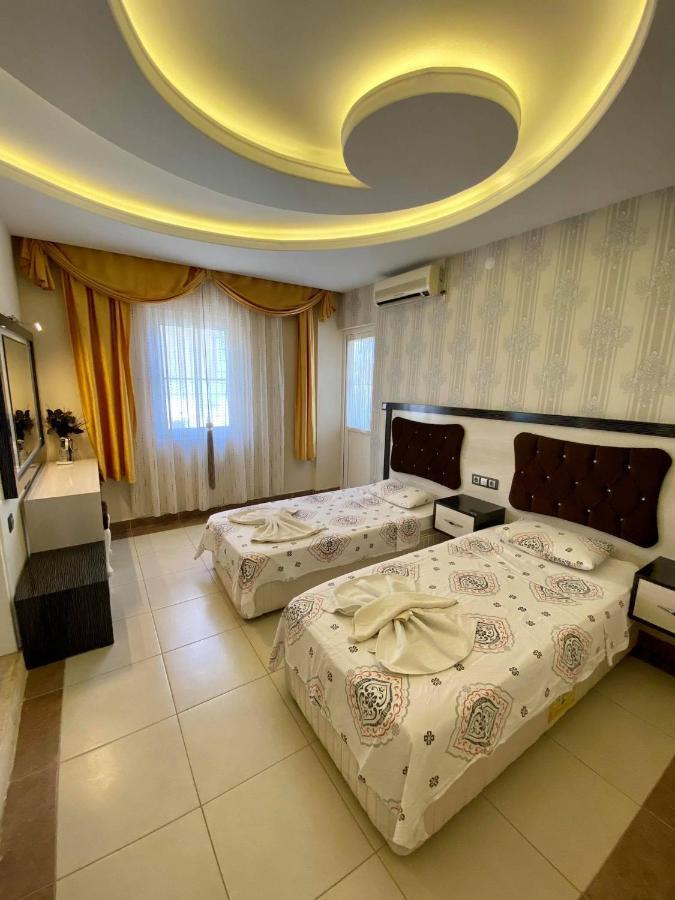 Yalcin Hotel & Villas โอลลุนเดนิซ ภายนอก รูปภาพ