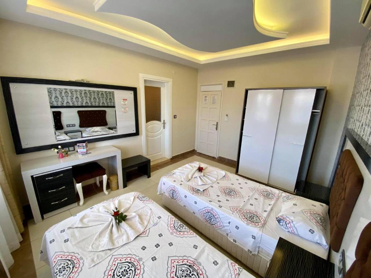 Yalcin Hotel & Villas โอลลุนเดนิซ ภายนอก รูปภาพ
