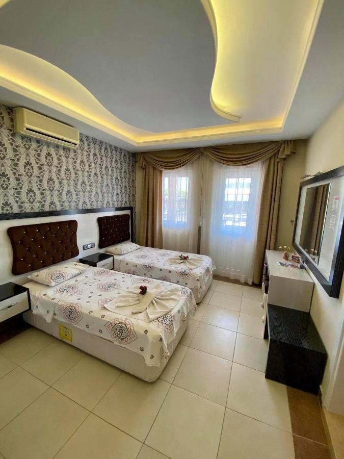 Yalcin Hotel & Villas โอลลุนเดนิซ ภายนอก รูปภาพ