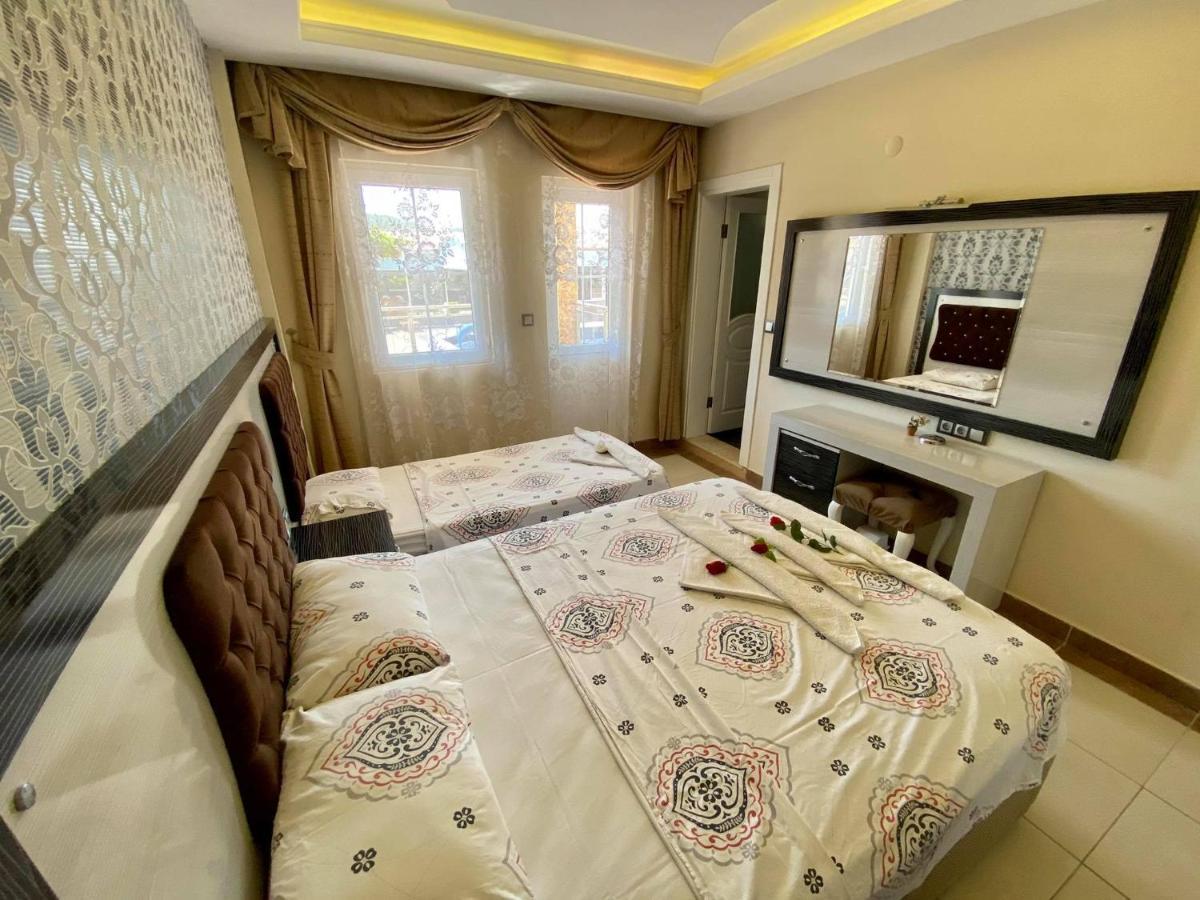 Yalcin Hotel & Villas โอลลุนเดนิซ ภายนอก รูปภาพ