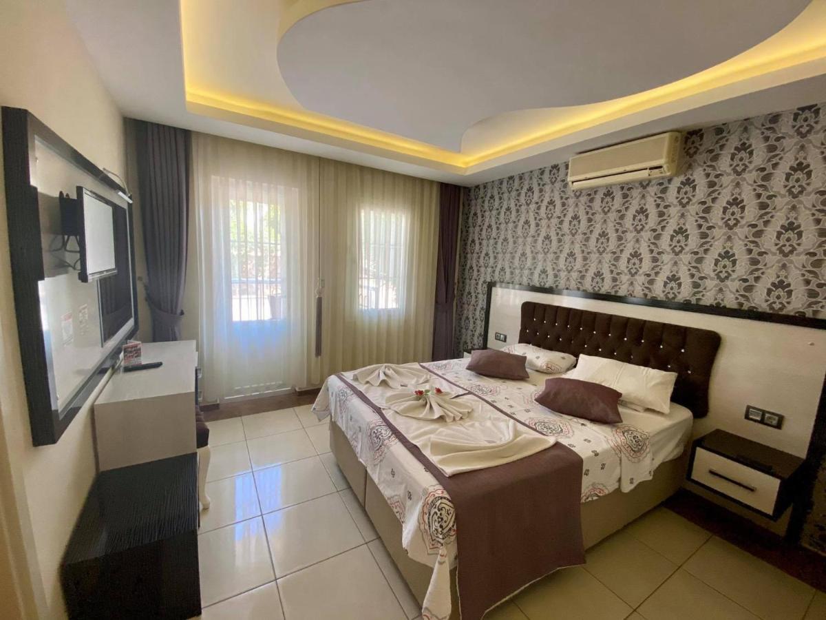 Yalcin Hotel & Villas โอลลุนเดนิซ ภายนอก รูปภาพ