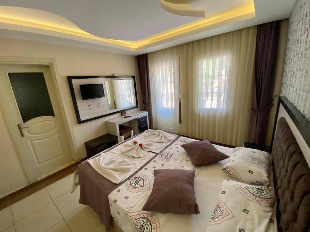 Yalcin Hotel & Villas โอลลุนเดนิซ ภายนอก รูปภาพ