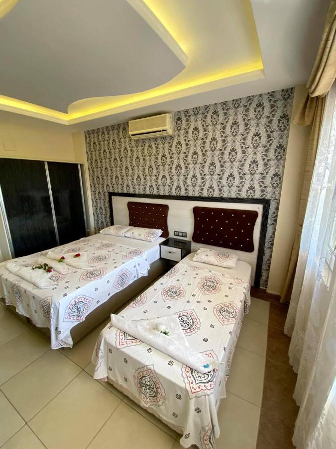 Yalcin Hotel & Villas โอลลุนเดนิซ ภายนอก รูปภาพ